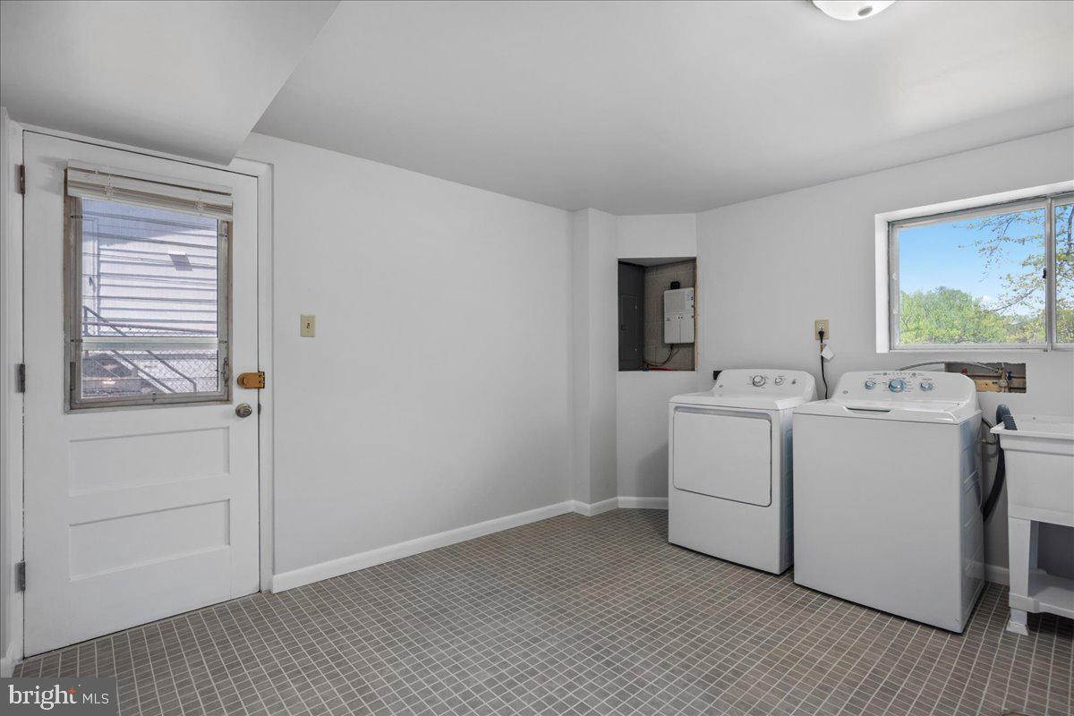 4227 Kinmount Road Lanham, MD 20706 - Photo 22 of 27 a room with storage and utility