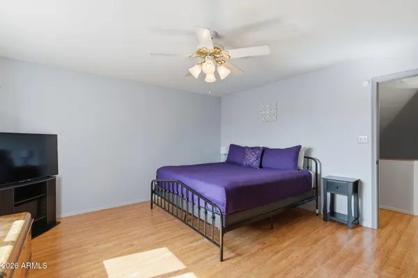 a kitchen with sink stove and cabinets