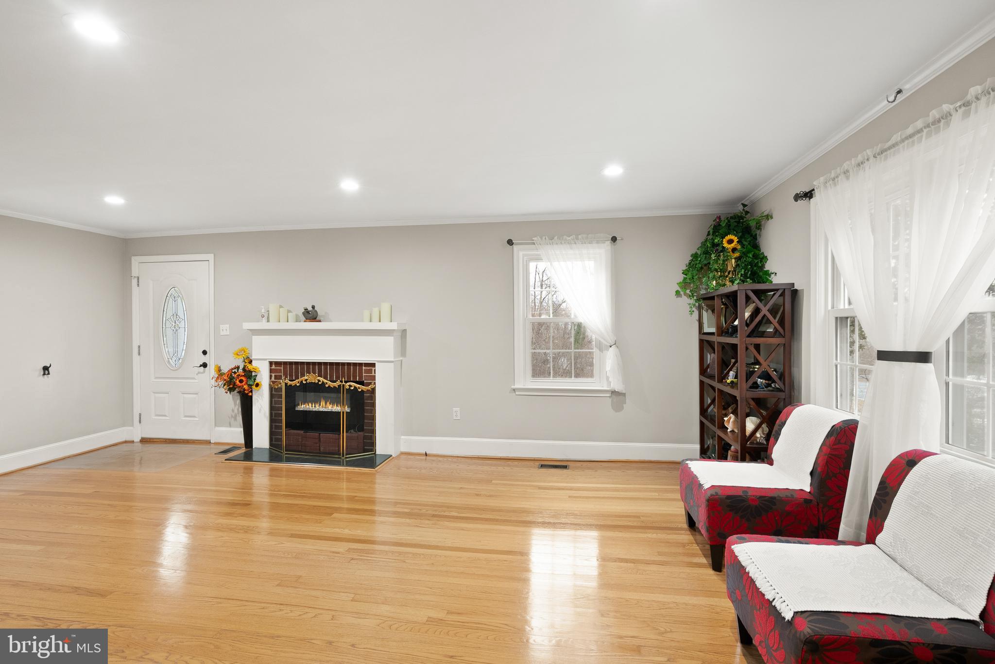2928 Hunter Road Fairfax, VA 22031 - Photo 13 of 73 a living room with furniture and a fireplace