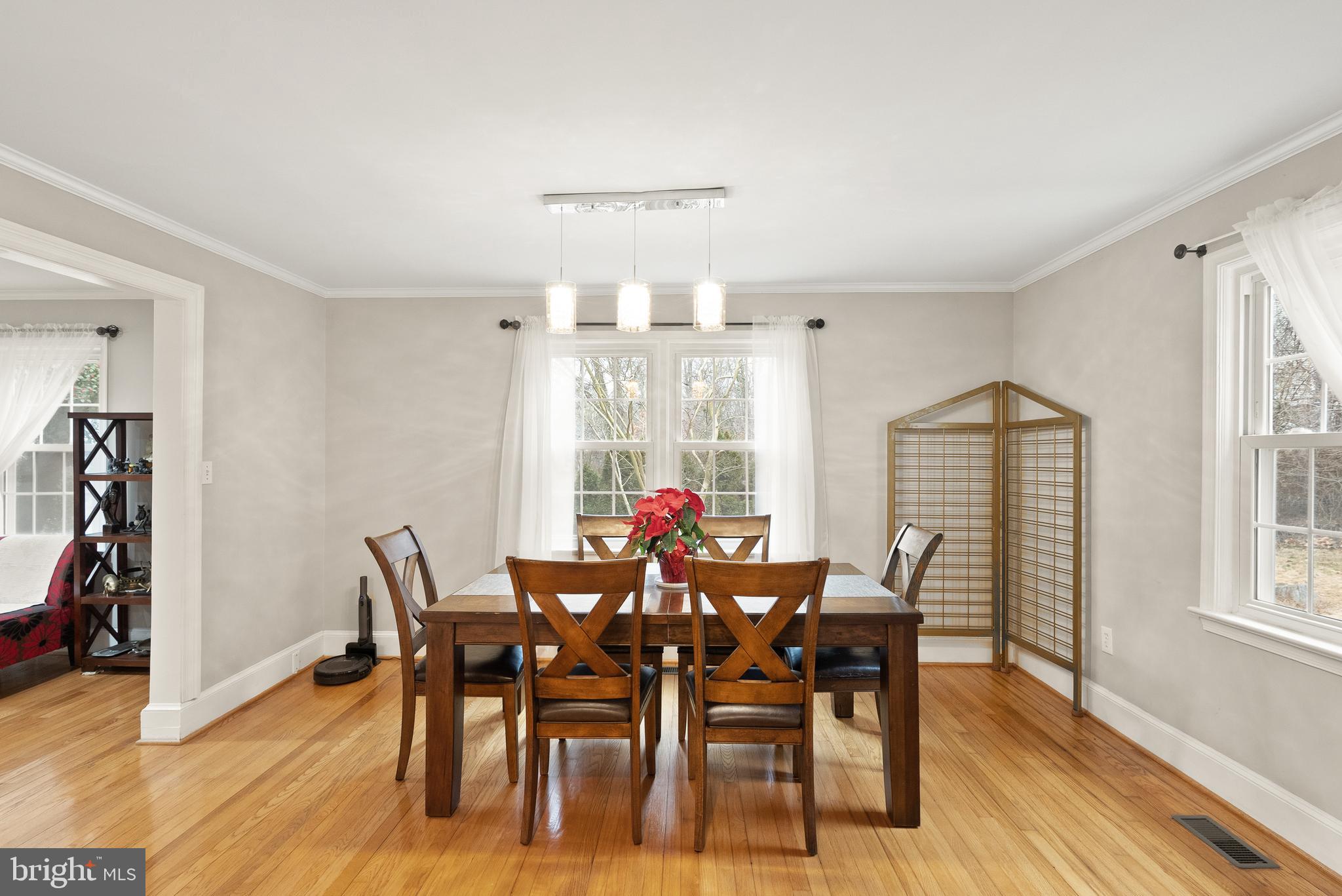 2928 Hunter Road Fairfax, VA 22031 - Photo 15 of 73 a view of a dining room with furniture and wooden floor