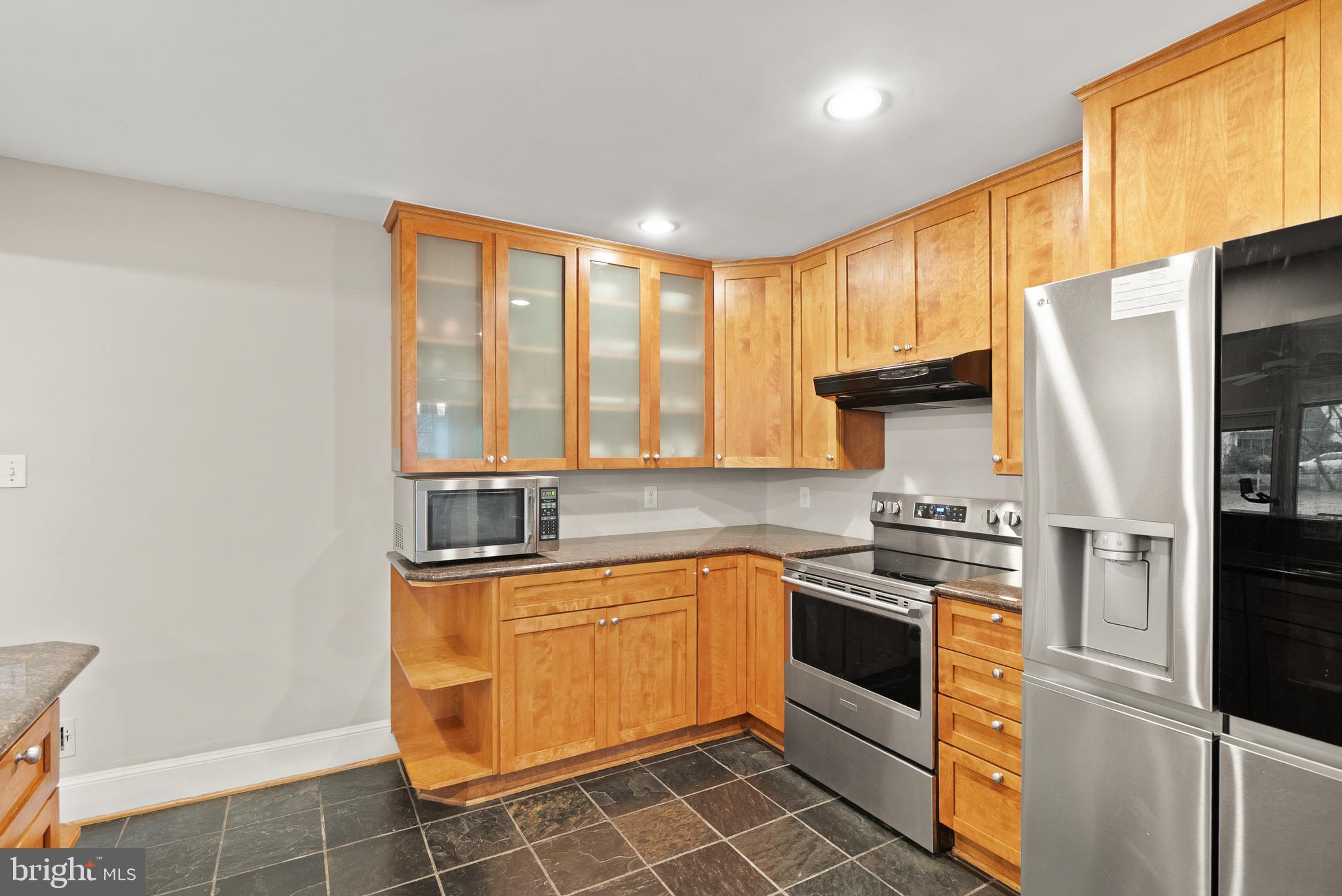 2928 Hunter Road Fairfax, VA 22031 - Photo 19 of 73 a kitchen with stainless steel appliances a stove sink and refrigerator
