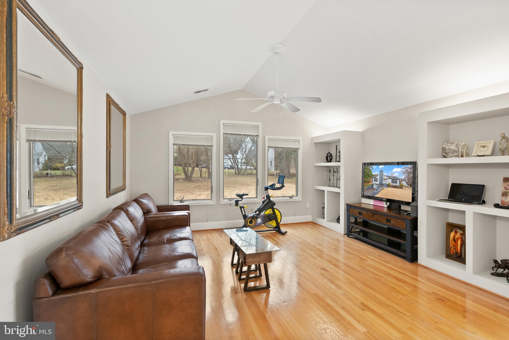 2928 Hunter Road Fairfax, VA 22031 - Photo 26 of 73 a living room with furniture fireplace and flat screen tv