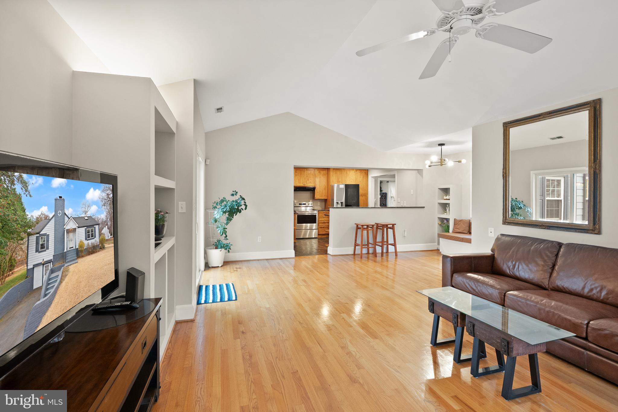 2928 Hunter Road Fairfax, VA 22031 - Photo 28 of 73 a living room with furniture and flat screen tv