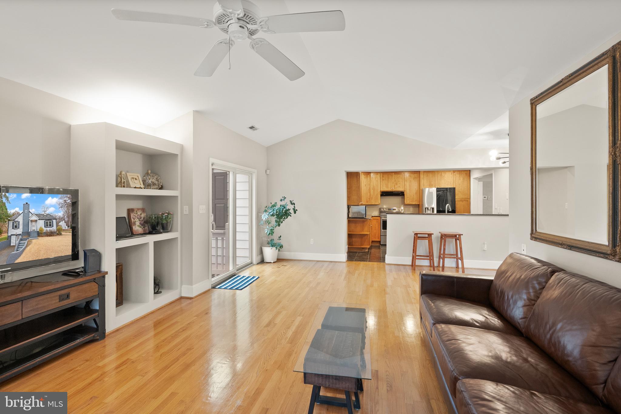 2928 Hunter Road Fairfax, VA 22031 - Photo 29 of 73 a living room with furniture and a flat screen tv