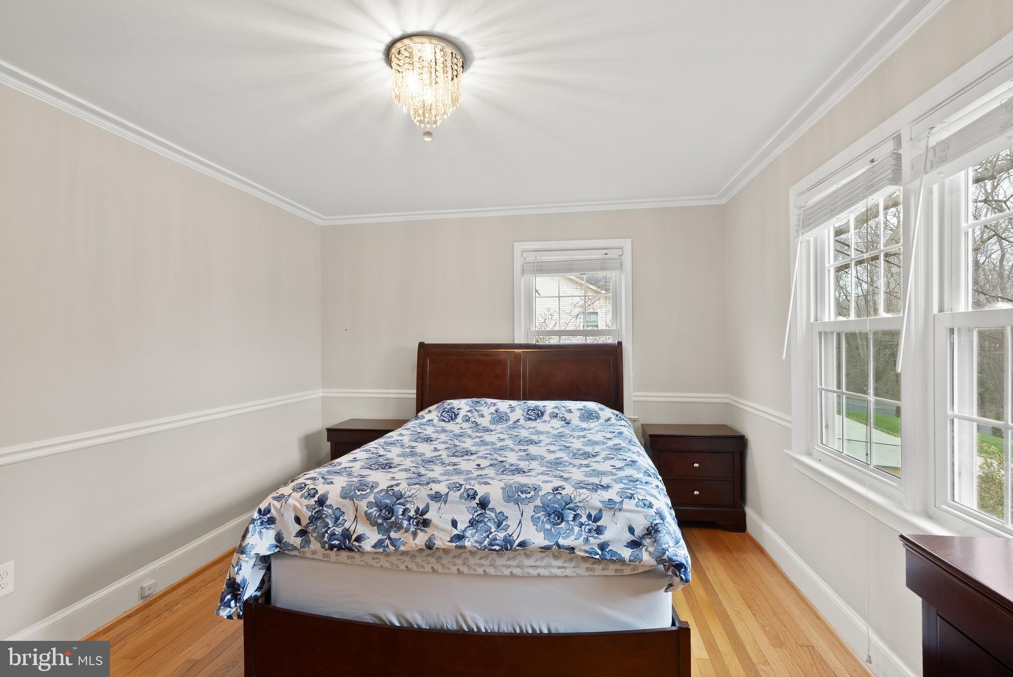 2928 Hunter Road Fairfax, VA 22031 - Photo 31 of 73 a bedroom with a large bed and a window