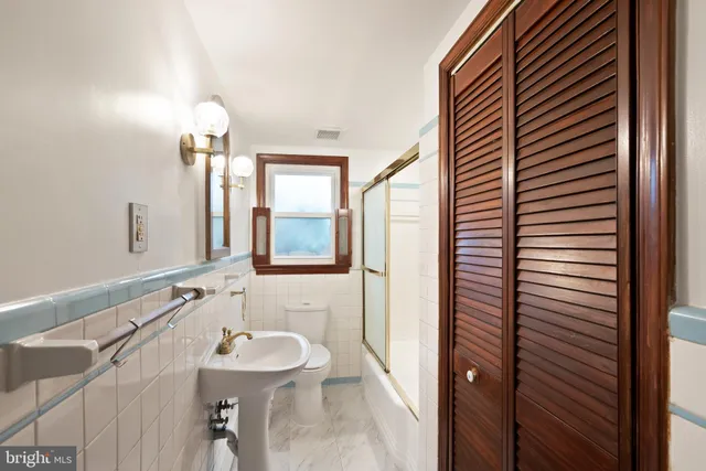 a view of an empty room with stairs