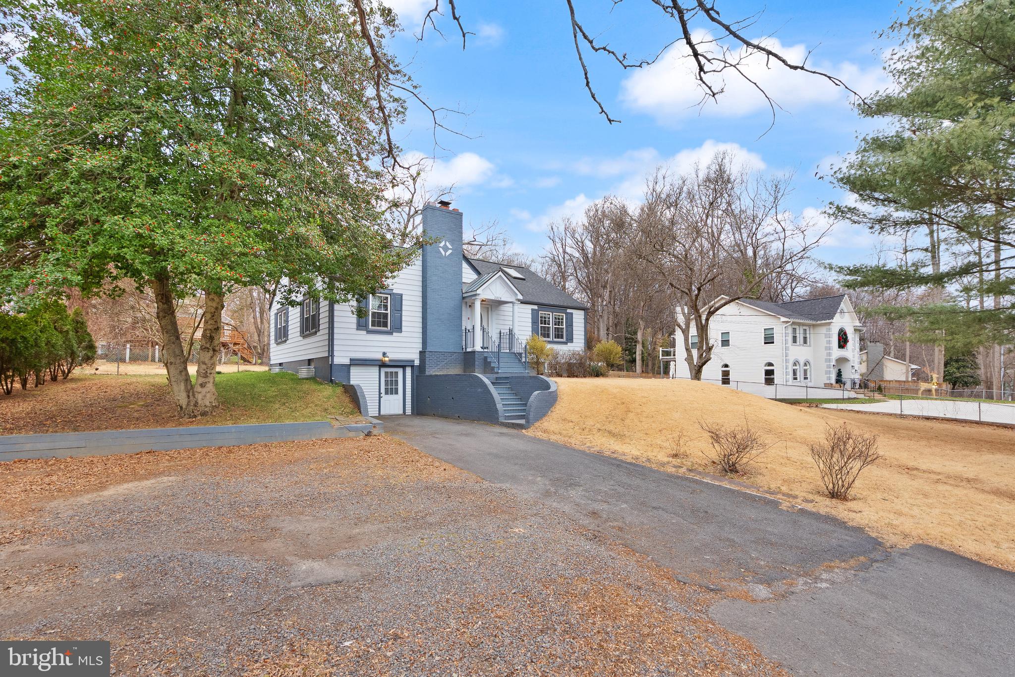 2928 Hunter Road Fairfax, VA 22031 - Photo 5 of 73 a view of road with large trees