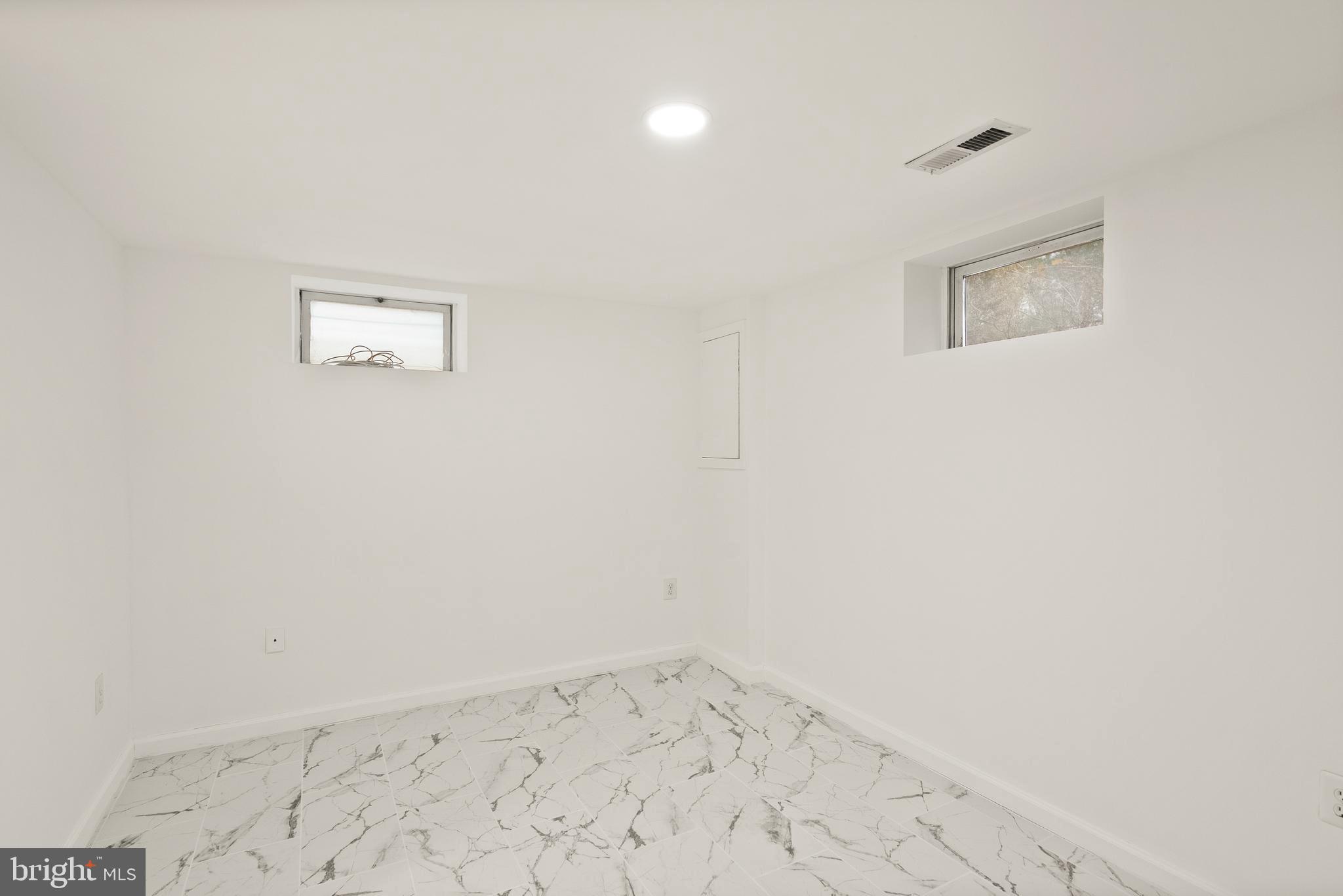 2928 Hunter Road Fairfax, VA 22031 - Photo 57 of 73 an empty room with a window