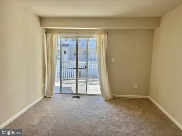 a view of an empty room with window