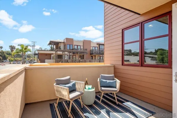 a view of a chairs and table on the terrace