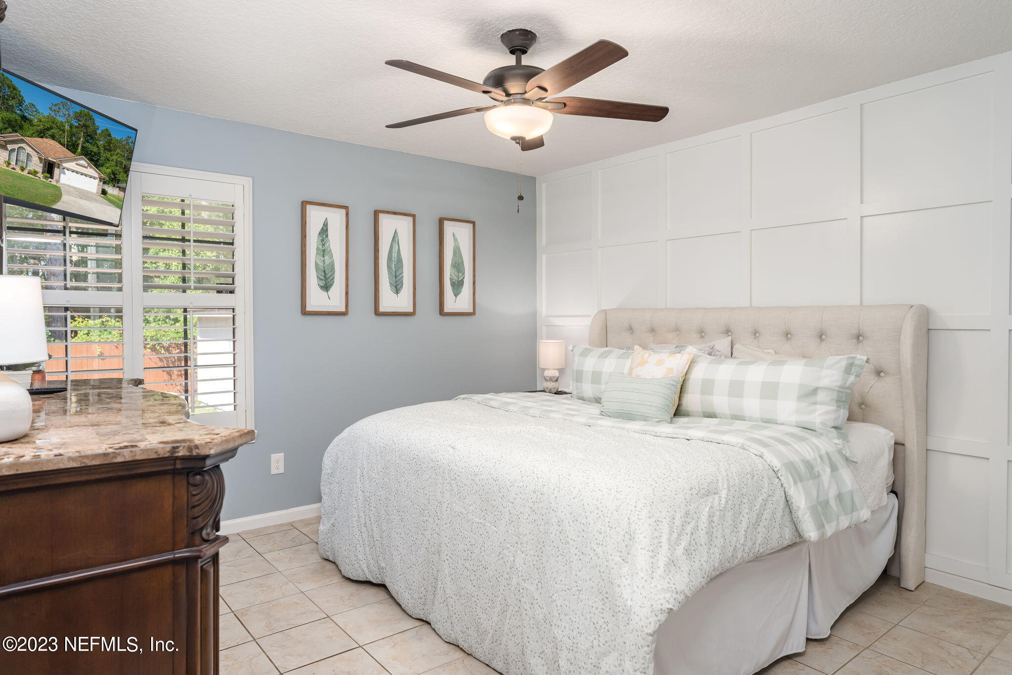 1662 Dockside Drive Fleming Island, FL 32003 - Photo 13 of 18 a bedroom with a bed and window