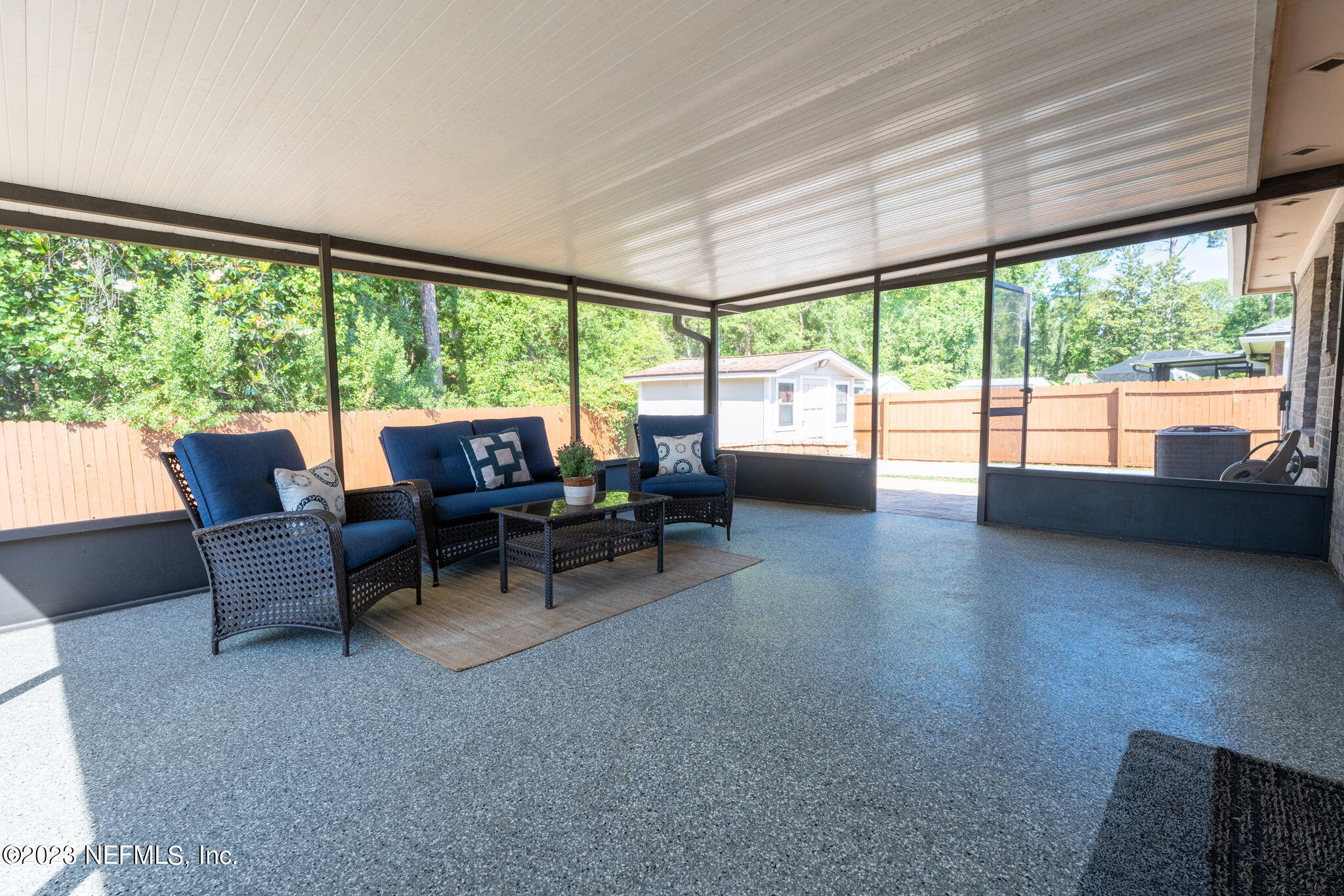 1662 Dockside Drive Fleming Island, FL 32003 - Photo 17 of 18 a living room with furniture and a large window