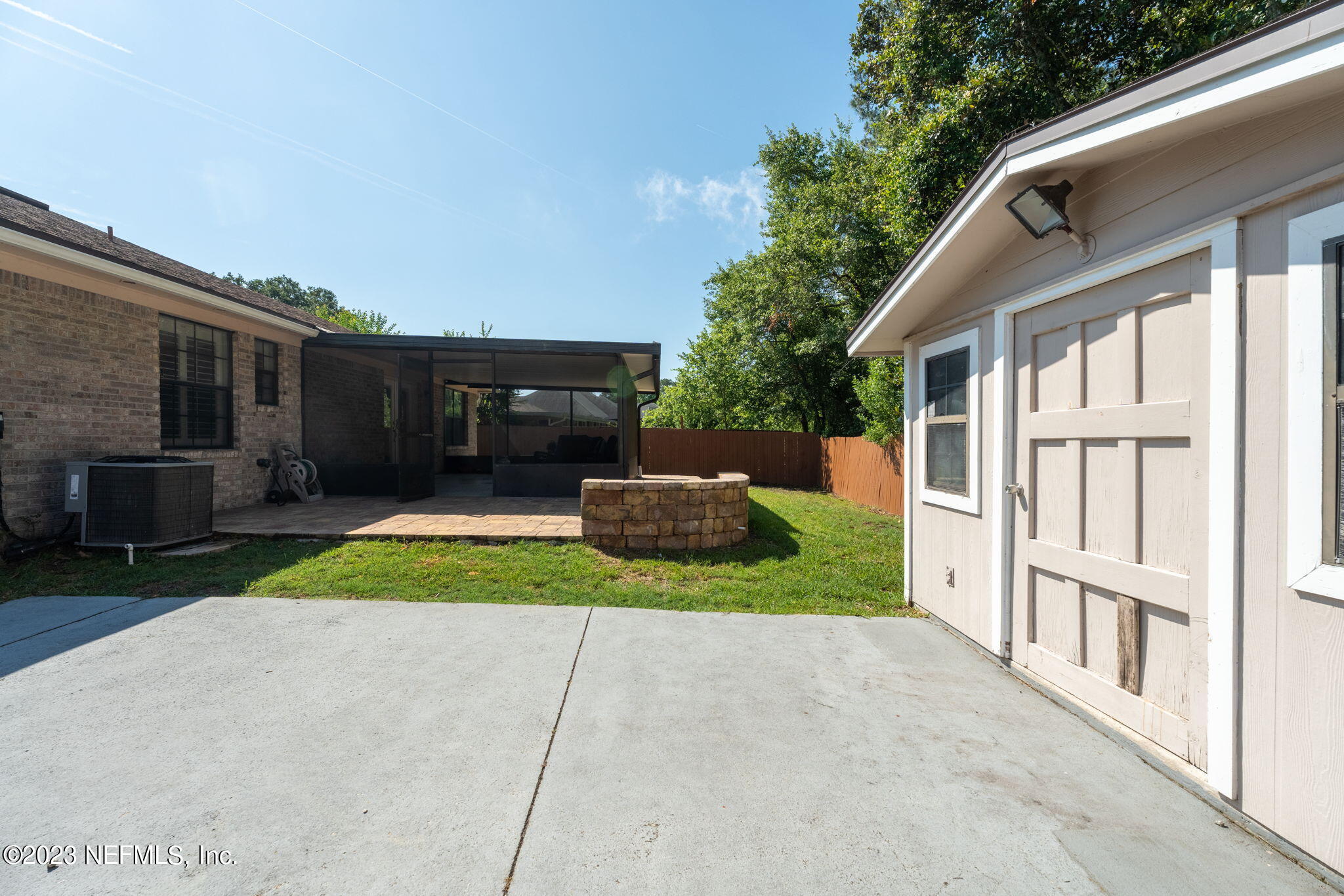 1662 Dockside Drive Fleming Island, FL 32003 - Photo 18 of 18 a view of a house with a yard and a garden