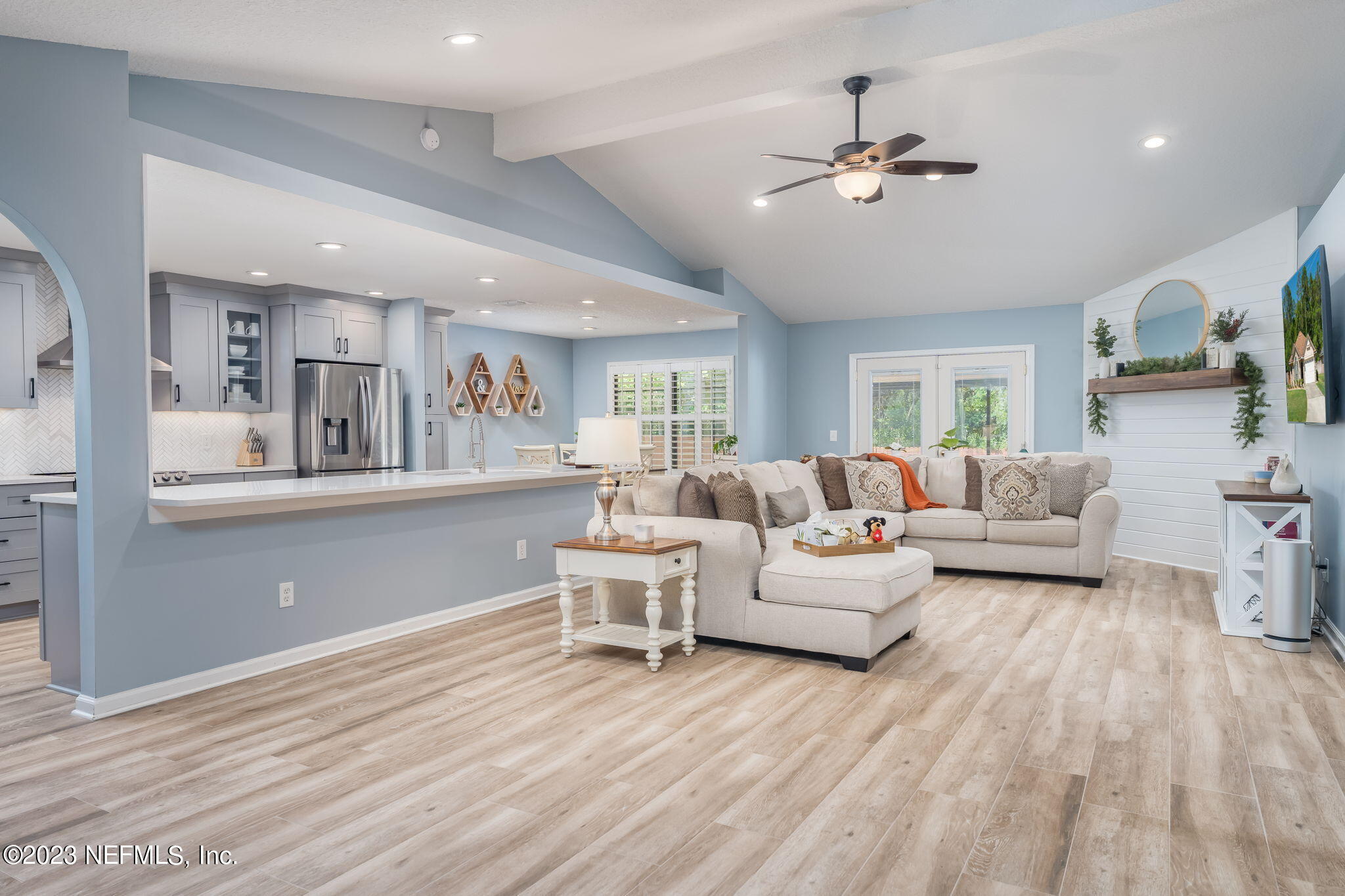 1662 Dockside Drive Fleming Island, FL 32003 - Photo 4 of 18 a living room with furniture and a wooden floor