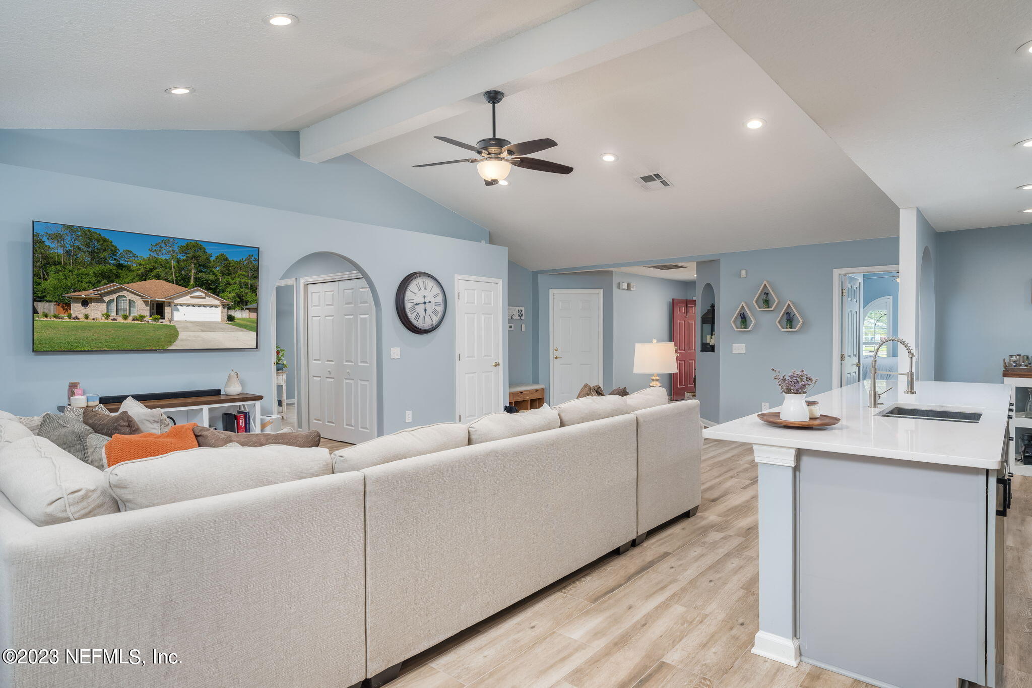 1662 Dockside Drive Fleming Island, FL 32003 - Photo 5 of 18 a living room with furniture and a large window