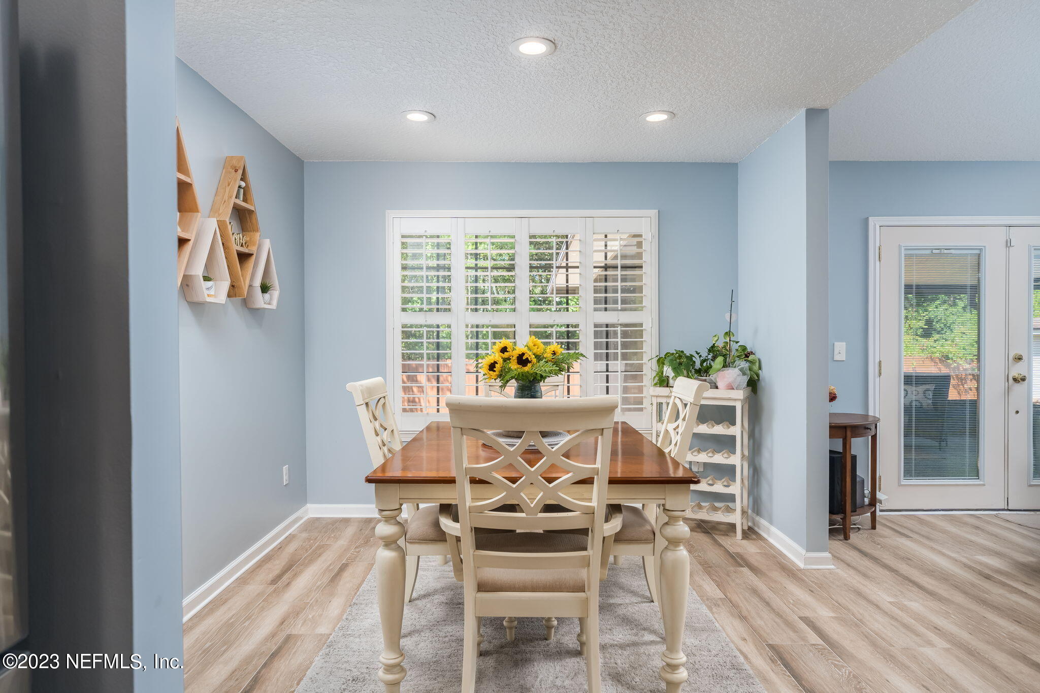 1662 Dockside Drive Fleming Island, FL 32003 - Photo 7 of 18 a view of a dining room with furniture window and wooden floor