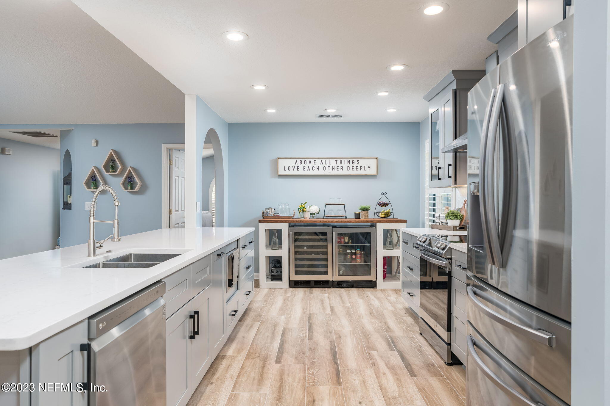 1662 Dockside Drive Fleming Island, FL 32003 - Photo 8 of 18 a kitchen with stainless steel appliances granite countertop a refrigerator and a sink