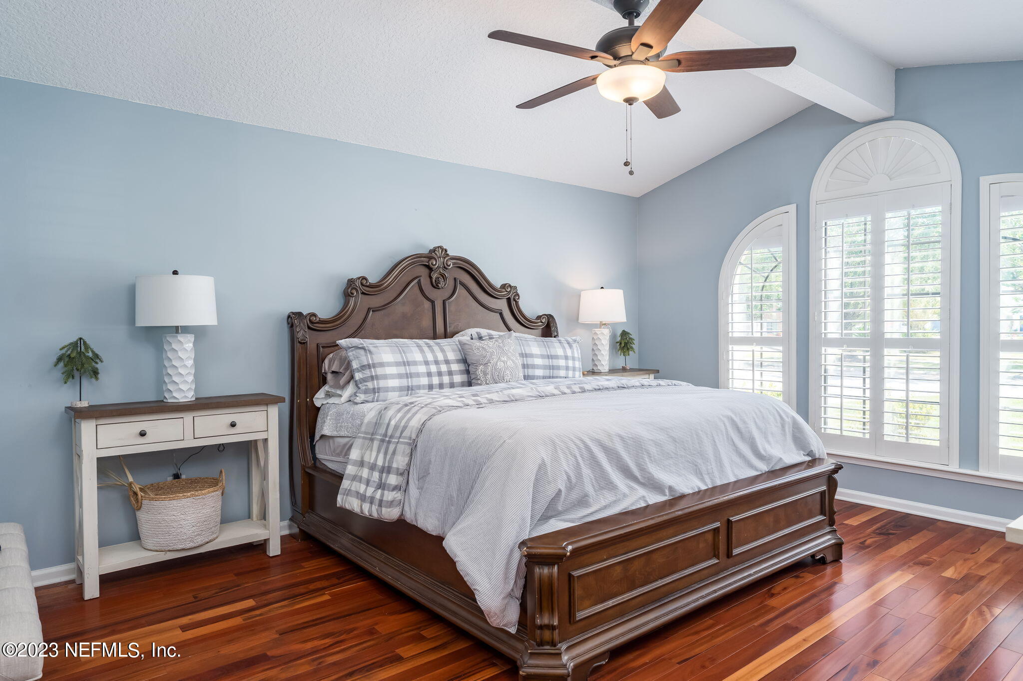 1662 Dockside Drive Fleming Island, FL 32003 - Photo 9 of 18 a bedroom with a bed and a chandelier