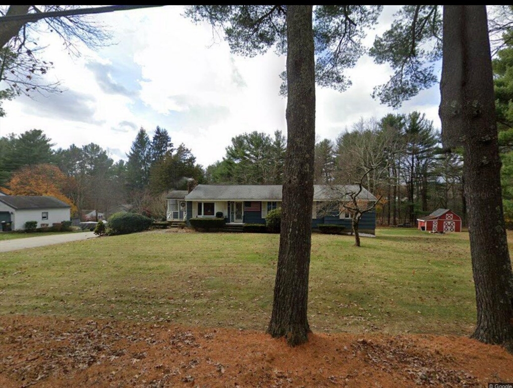 153 New Boston Road Sturbridge, MA 01566 - Photo 1 of 32 a view of a house with a backyard