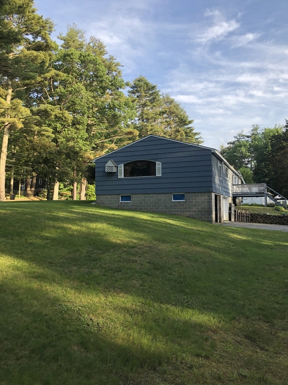 153 New Boston Road Sturbridge, MA 01566 - Photo 8 of 32 a view of a big house with a big yard and large trees