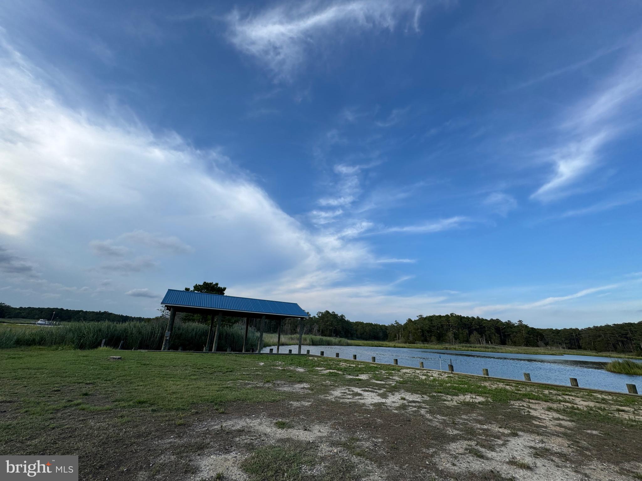 2707 Clara Road Tyaskin, MD 21865 - Photo 4 of 10 a view of a lake with a big yard