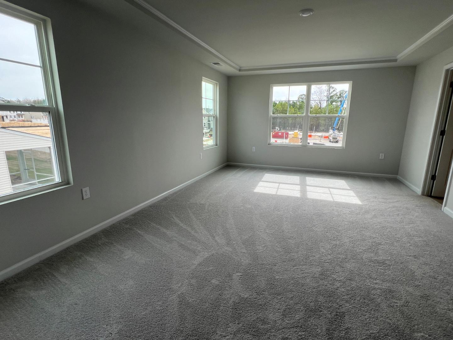 5028 Arkose Drive Raleigh, NC 27610 - Photo 20 of 36 an empty room with windows