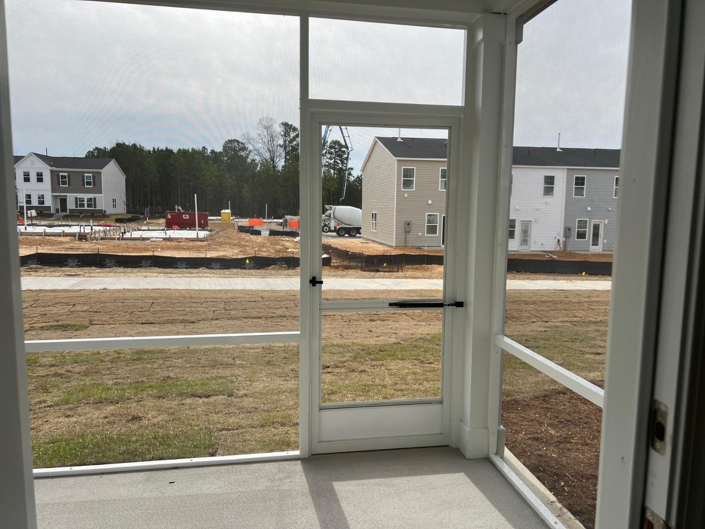 5028 Arkose Drive Raleigh, NC 27610 - Photo 22 of 36 a view of water heater room with a floor to ceiling window