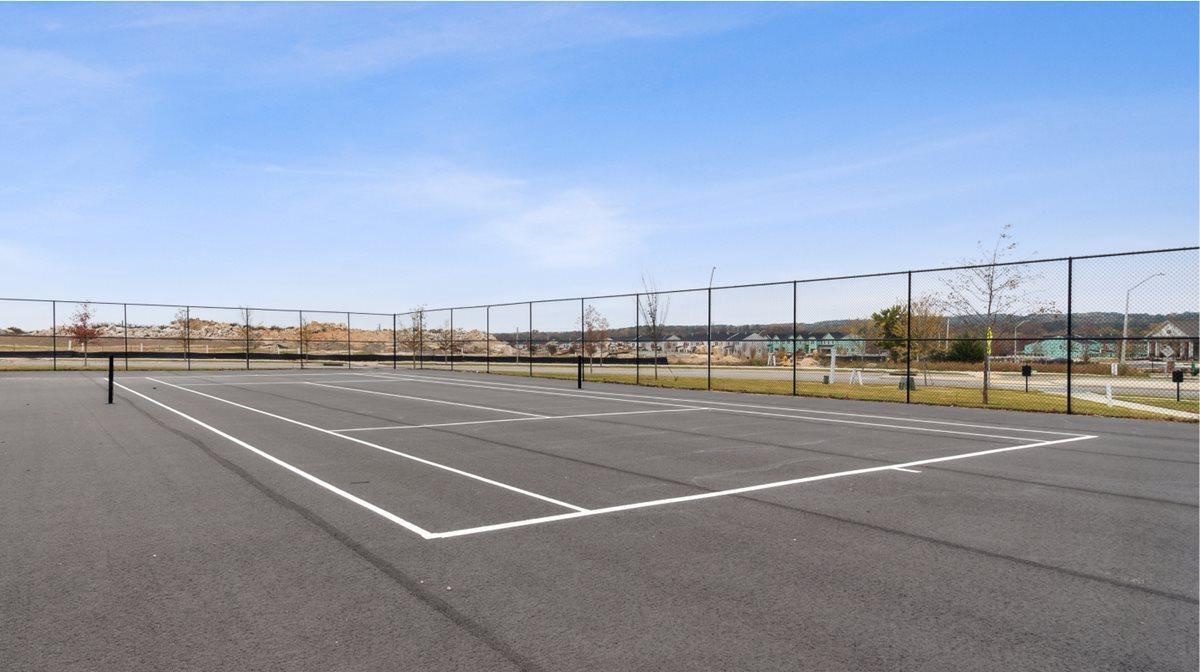 5028 Arkose Drive Raleigh, NC 27610 - Photo 25 of 36 a view of a tennis court