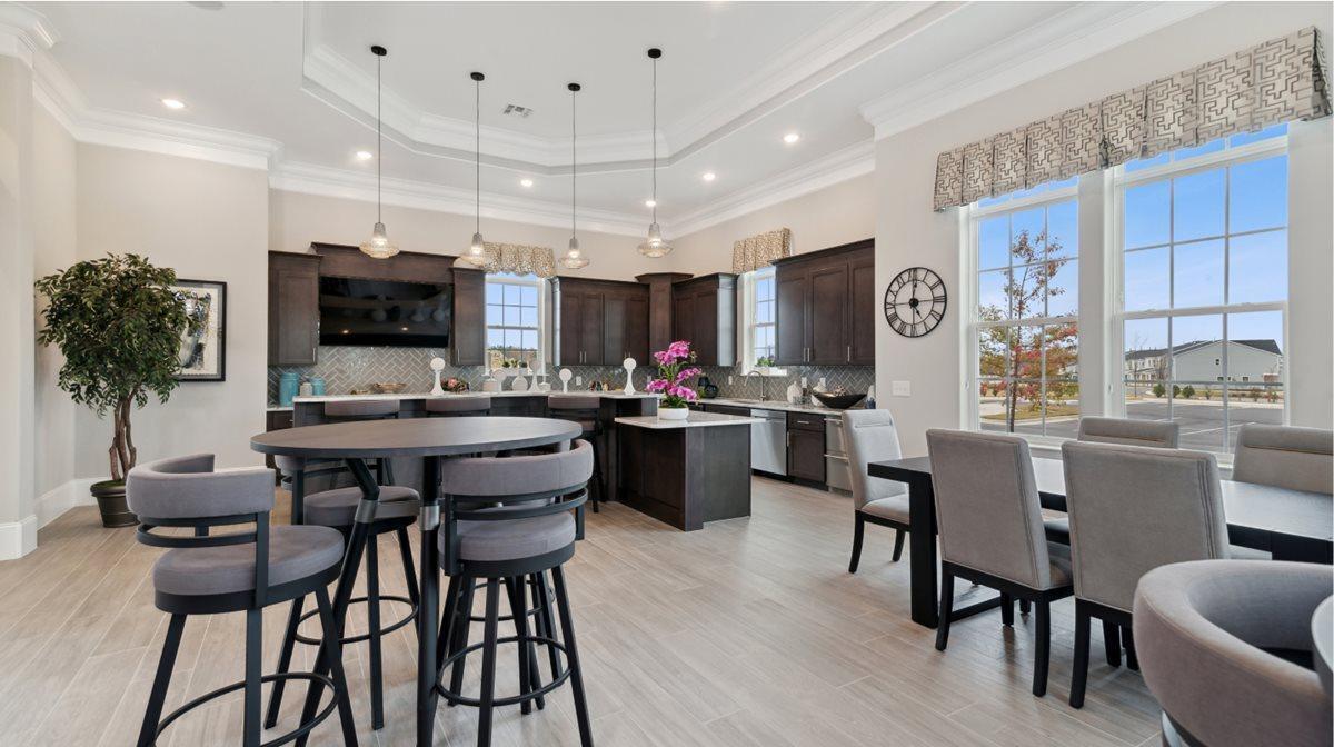 5028 Arkose Drive Raleigh, NC 27610 - Photo 27 of 36 a kitchen with a dining table chairs and view kitchen