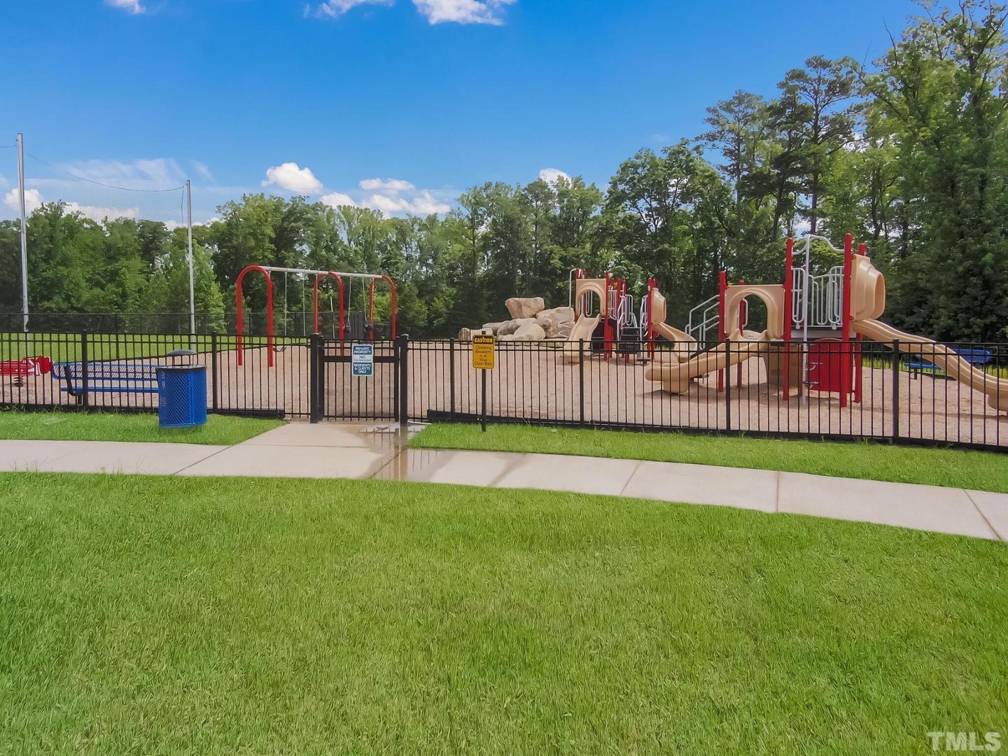 5028 Arkose Drive Raleigh, NC 27610 - Photo 32 of 36 a view of a house with a backyard