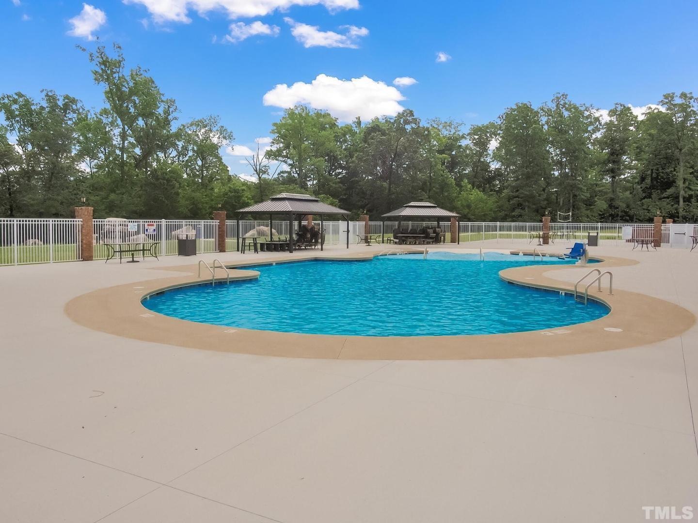 5028 Arkose Drive Raleigh, NC 27610 - Photo 33 of 36 a view of a house with swimming pool