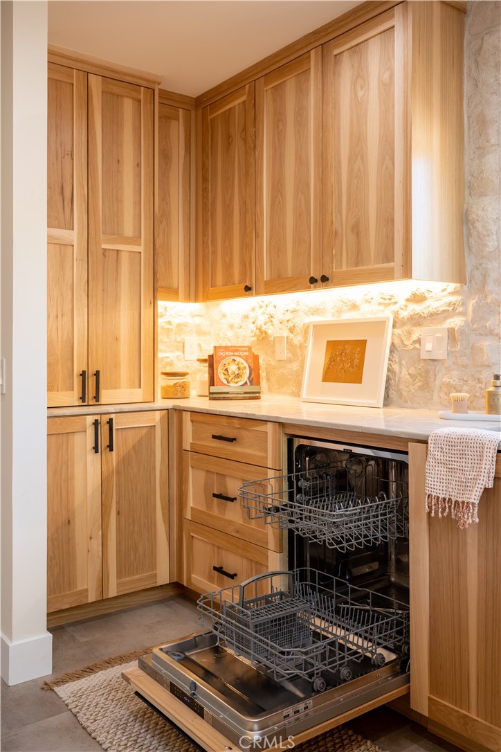 2358 Fir Drive Running Springs, CA 92382 - Photo 14 of 40 a kitchen with granite countertop a stove and a refrigerator