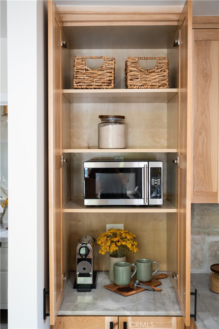 2358 Fir Drive Running Springs, CA 92382 - Photo 15 of 40 a living room with storage and utility