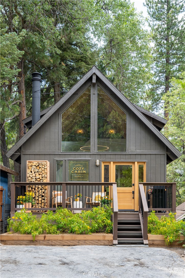 2358 Fir Drive Running Springs, CA 92382 - Photo 2 of 40 a view of a house with a yard and plants