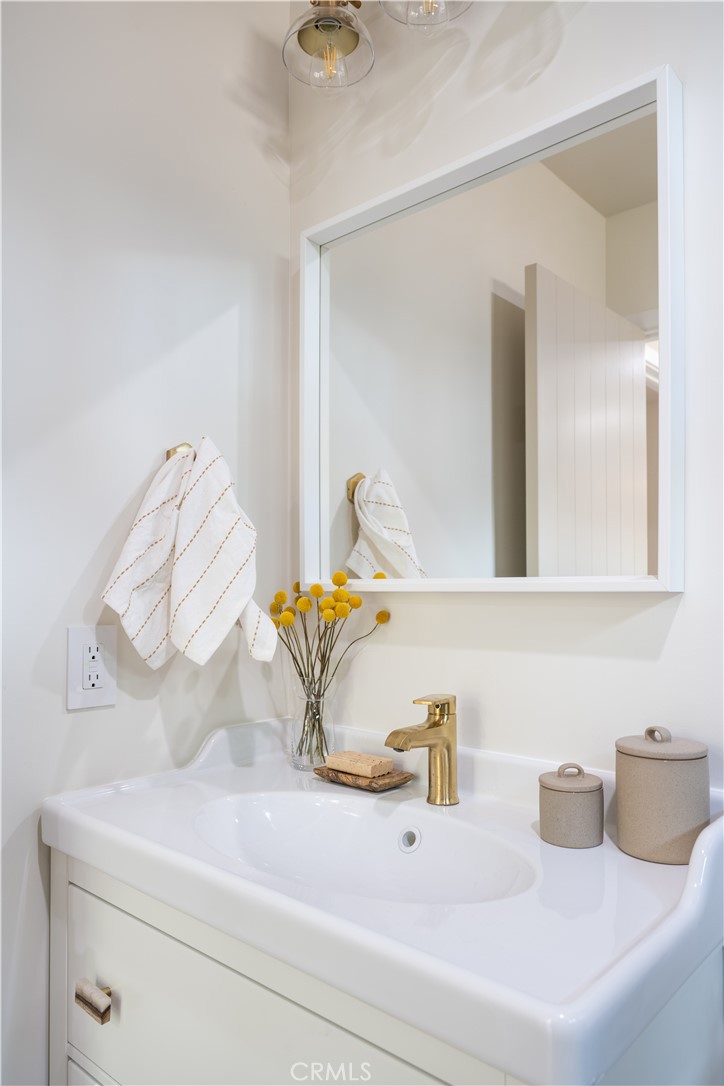 2358 Fir Drive Running Springs, CA 92382 - Photo 21 of 40 a bathroom with a sink and a mirror