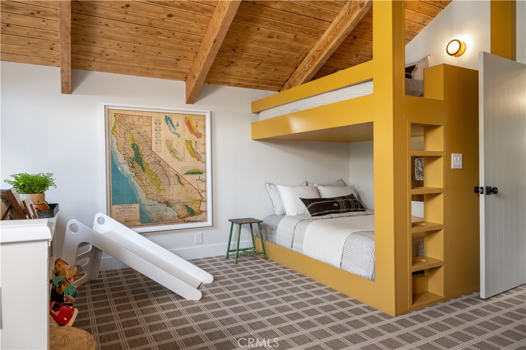 2358 Fir Drive Running Springs, CA 92382 - Photo 23 of 40 a bedroom with a bed and a window