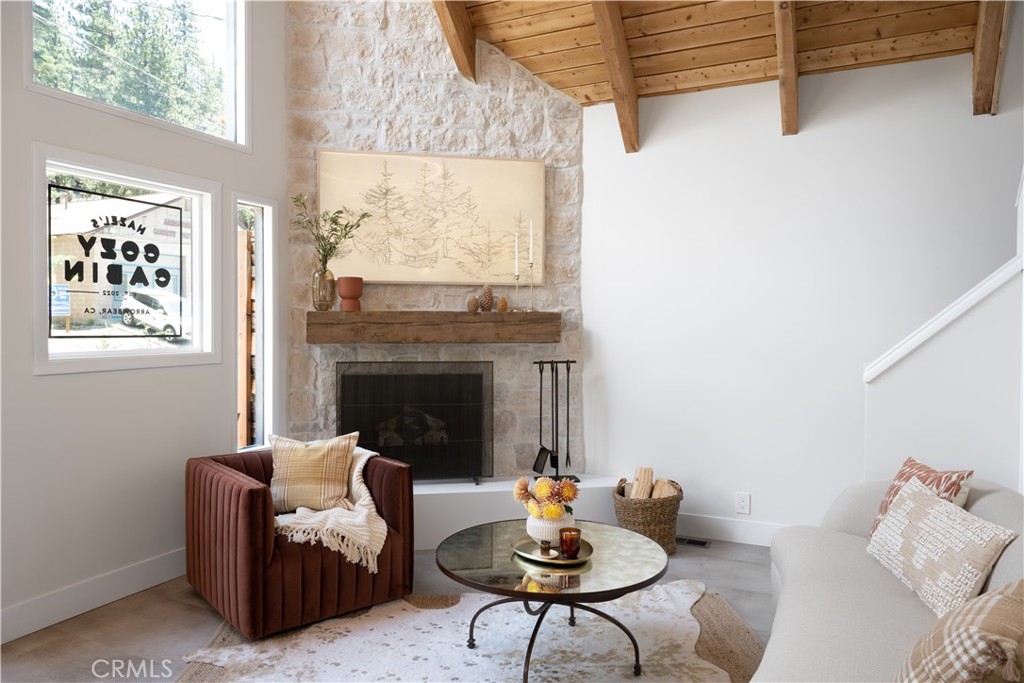 2358 Fir Drive Running Springs, CA 92382 - Photo 3 of 40 a living room with furniture and a fireplace