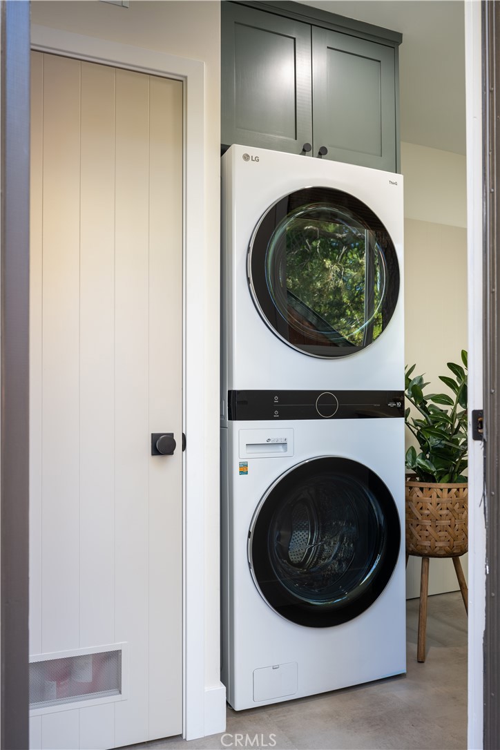 2358 Fir Drive Running Springs, CA 92382 - Photo 31 of 40 a close up view of a washer and dryer