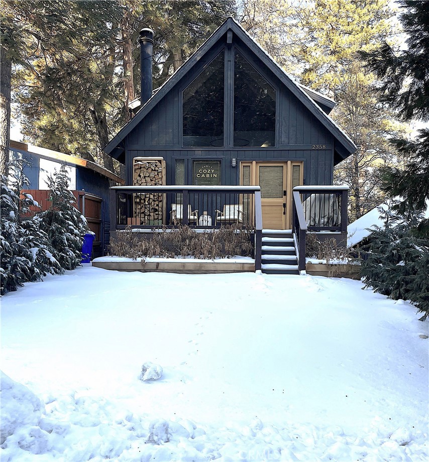 2358 Fir Drive Running Springs, CA 92382 - Photo 36 of 40 a view of a house with a yard covered in snow