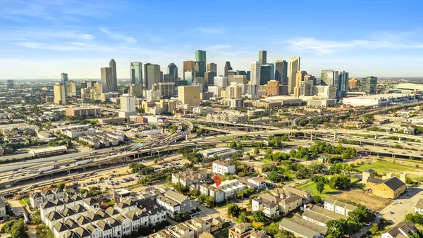 a view of a city with tall buildings