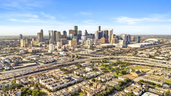 a view of a city with tall buildings