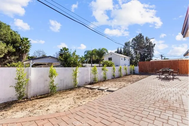 a view of a terrace with sitting area