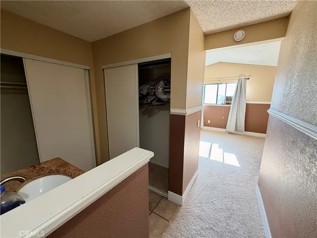 a bathroom with a sink and toilet