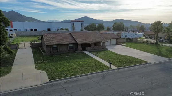 a aerial view of a house with garden