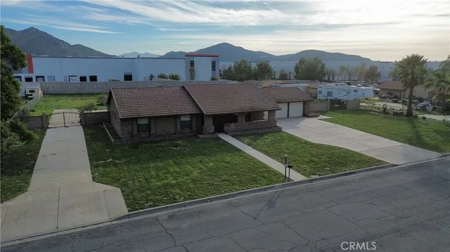 a aerial view of a house with garden