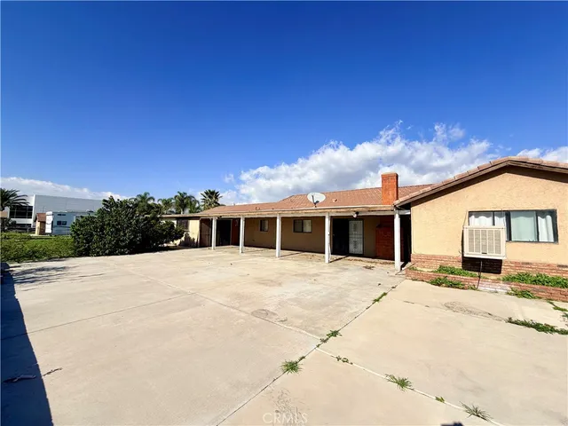 a view of a house with a patio