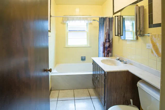 a bathroom with a sink and a bathtub