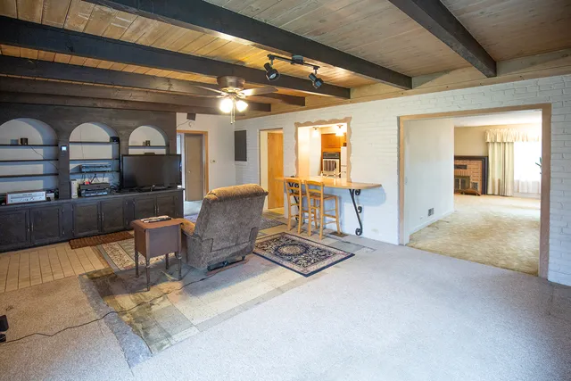 a view of a livingroom with furniture