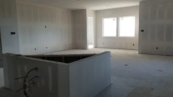 a view of a kitchen that has a sink and a stove