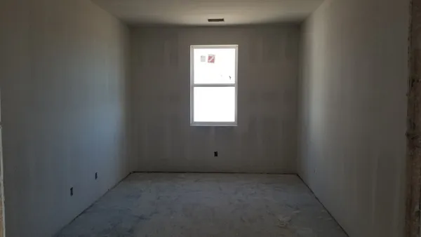 an empty room with a window